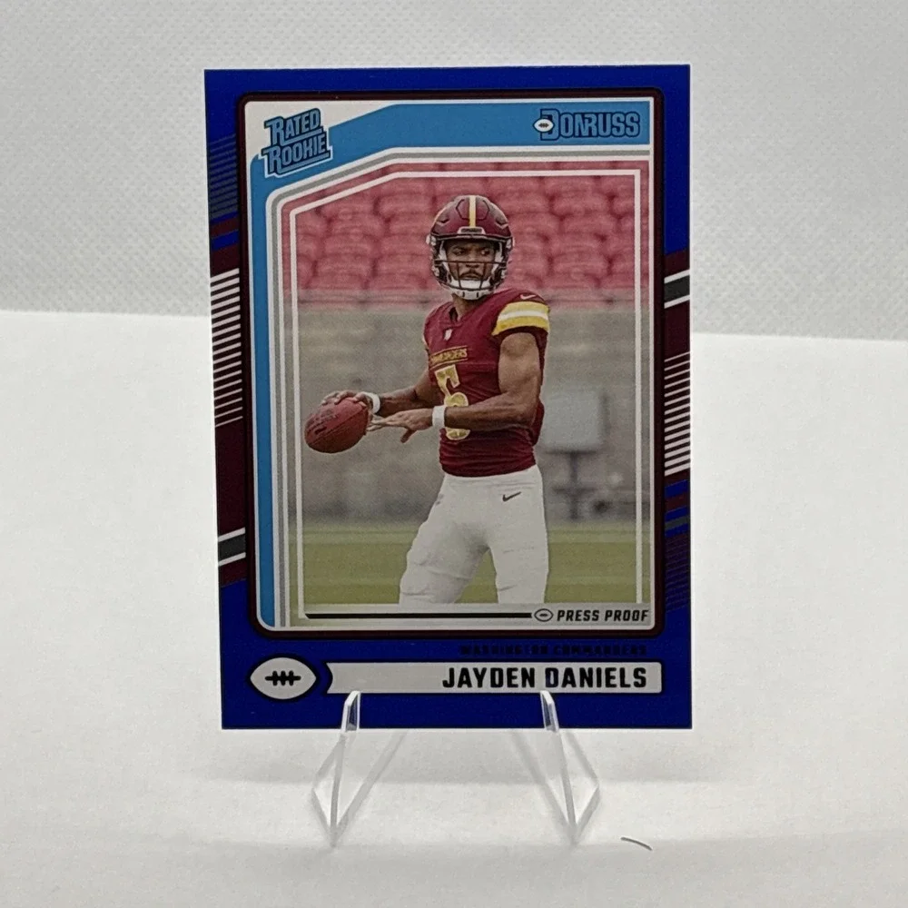 2024 Donruss Jayden Daniels RC #389 Blue Press Proof Rated Rookie SP Commanders